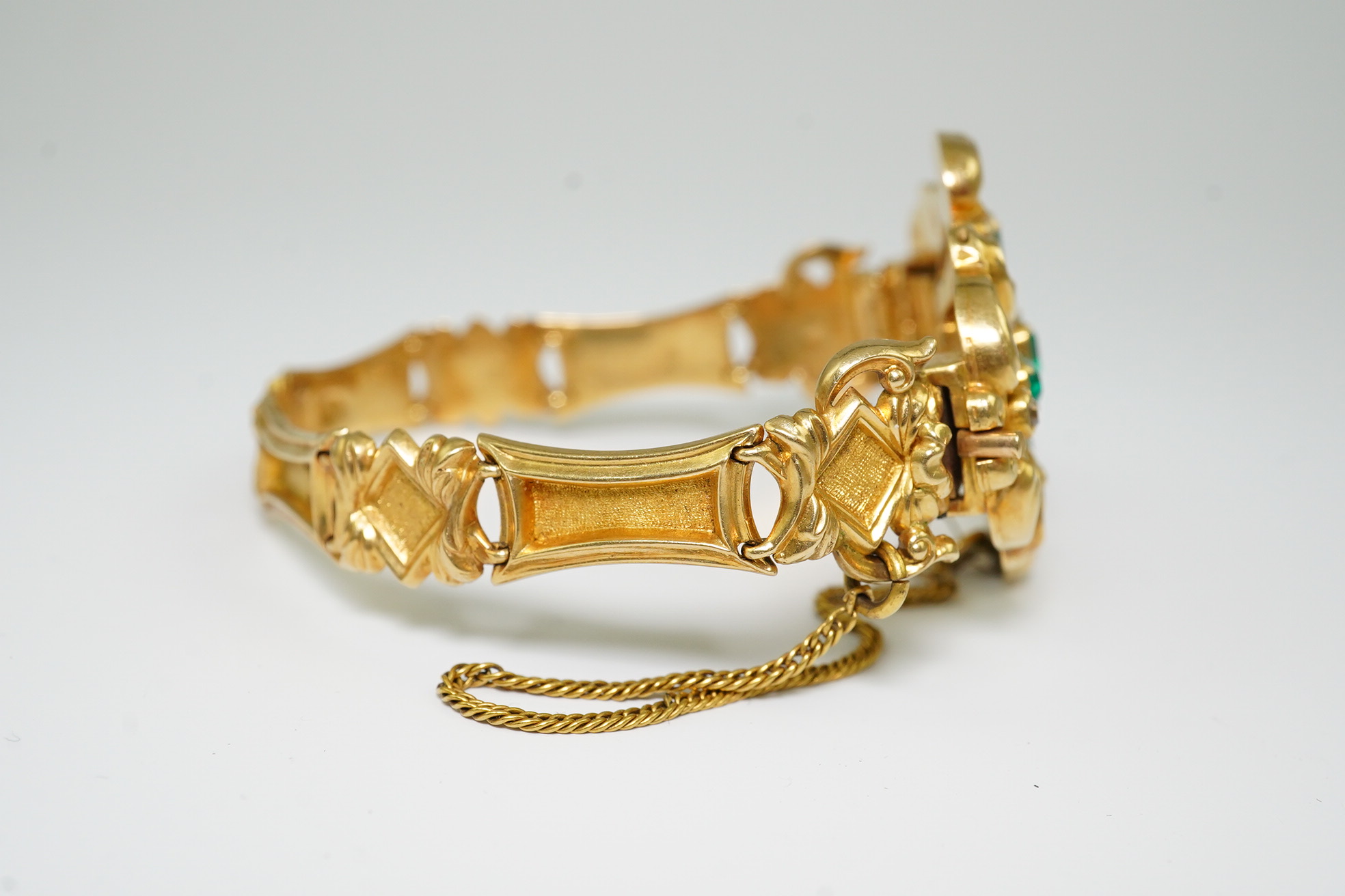 A Victorian gold, diamond and emerald cluster set bracelet